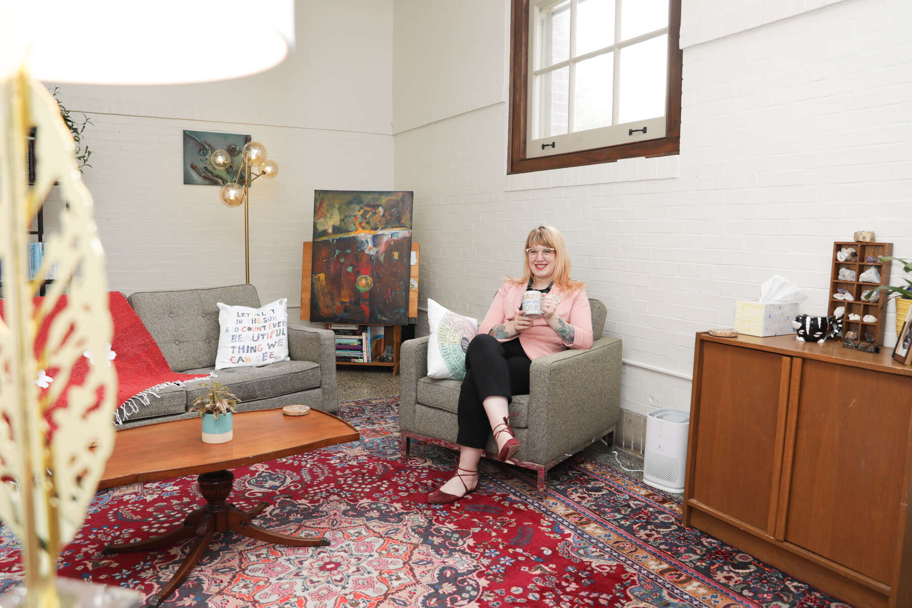 Ashera DeRosa in the Whole Stories Therapy offices